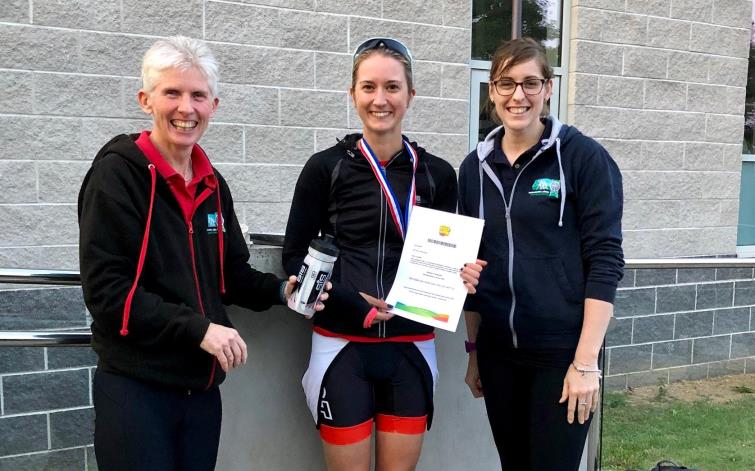 Pictured is Bethan Phillips, 1st overall female, with Jayne Richards (Go-Tri Co-ordinator) and Lisa Starkey